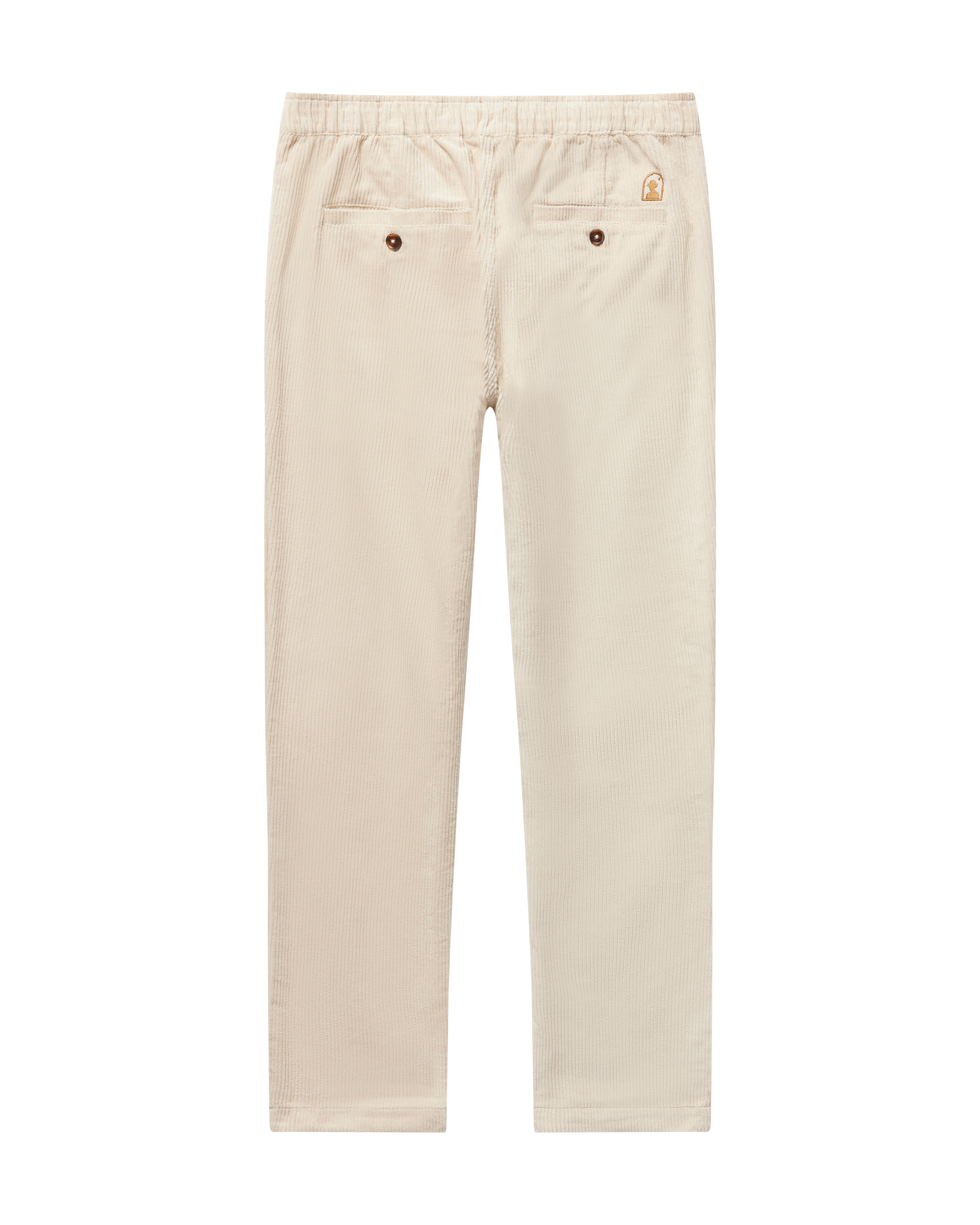 The Corsica Corduroy Pant - Alabaster White by Dandy Del Mar features Italian corduroy, a tailored fit, elastic waistband, two front pockets with button details, and a small embroidered patch near the right pocket.