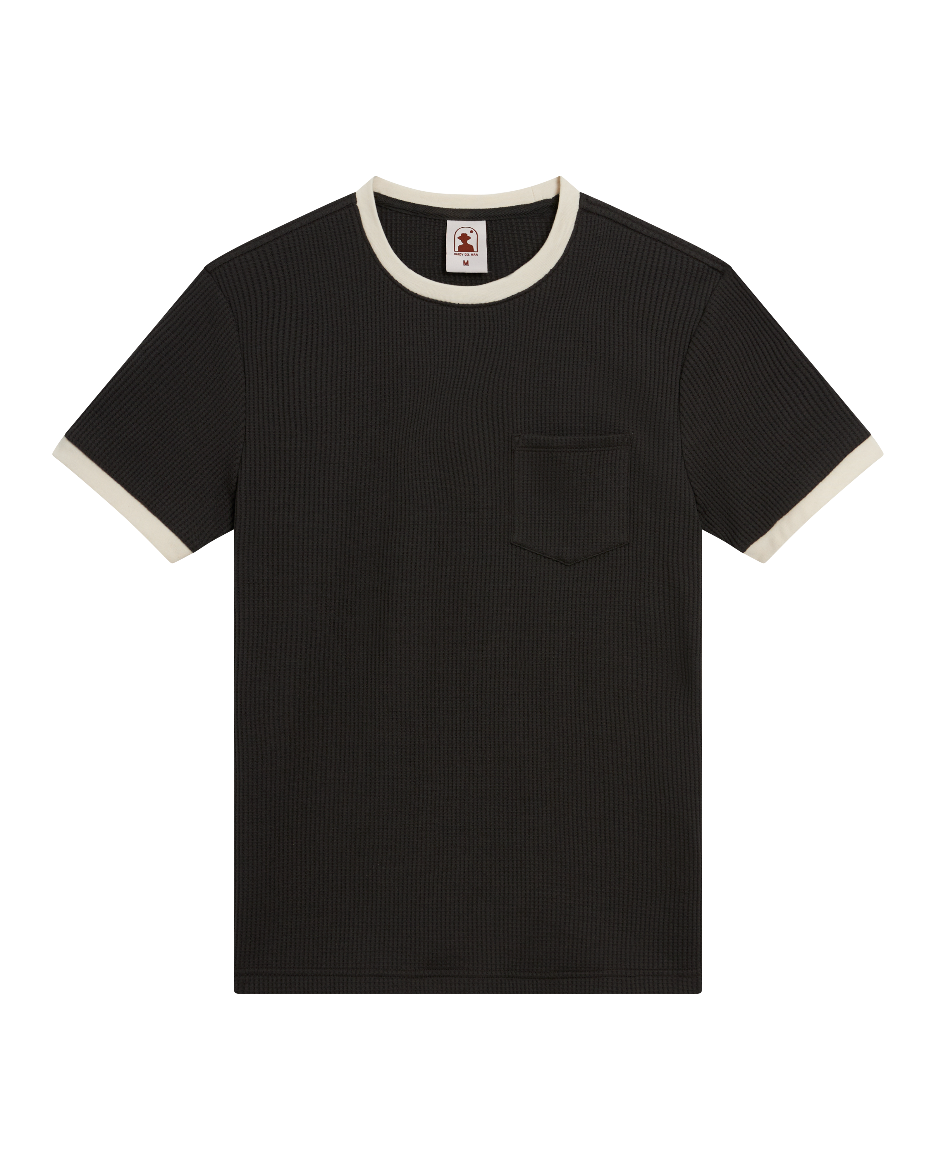 The Dandy Del Mar Cannes Waffle Knit Tee - Albatross features black short sleeves, a white contrast collar and cuffs, ribbed waffle knit texture, and a small chest pocket.