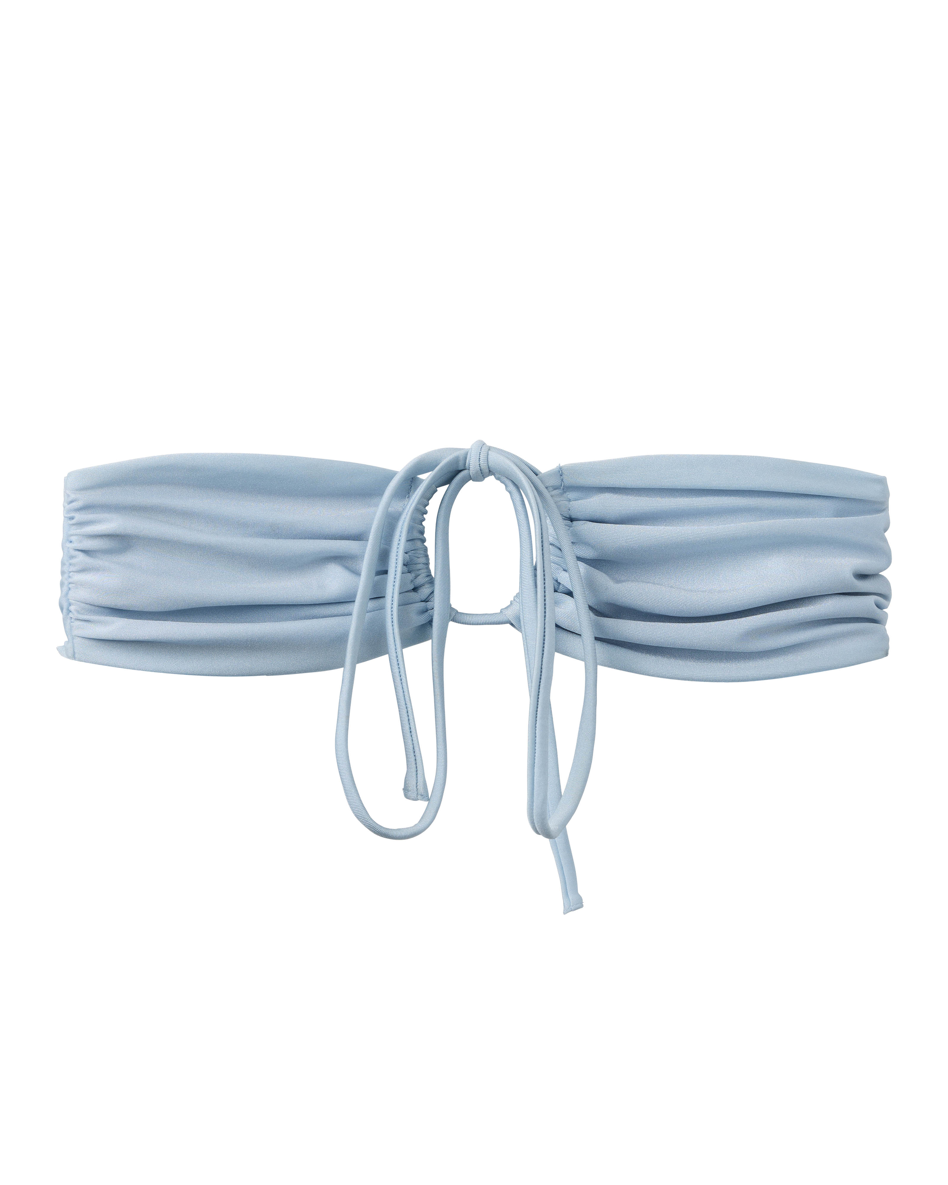 The Biarritz Top - Comet by Dandy Del Mar features a light blue tie-front bandeau design with ruched fabric and cinch detail for a versatile fit, displayed on a plain background.
