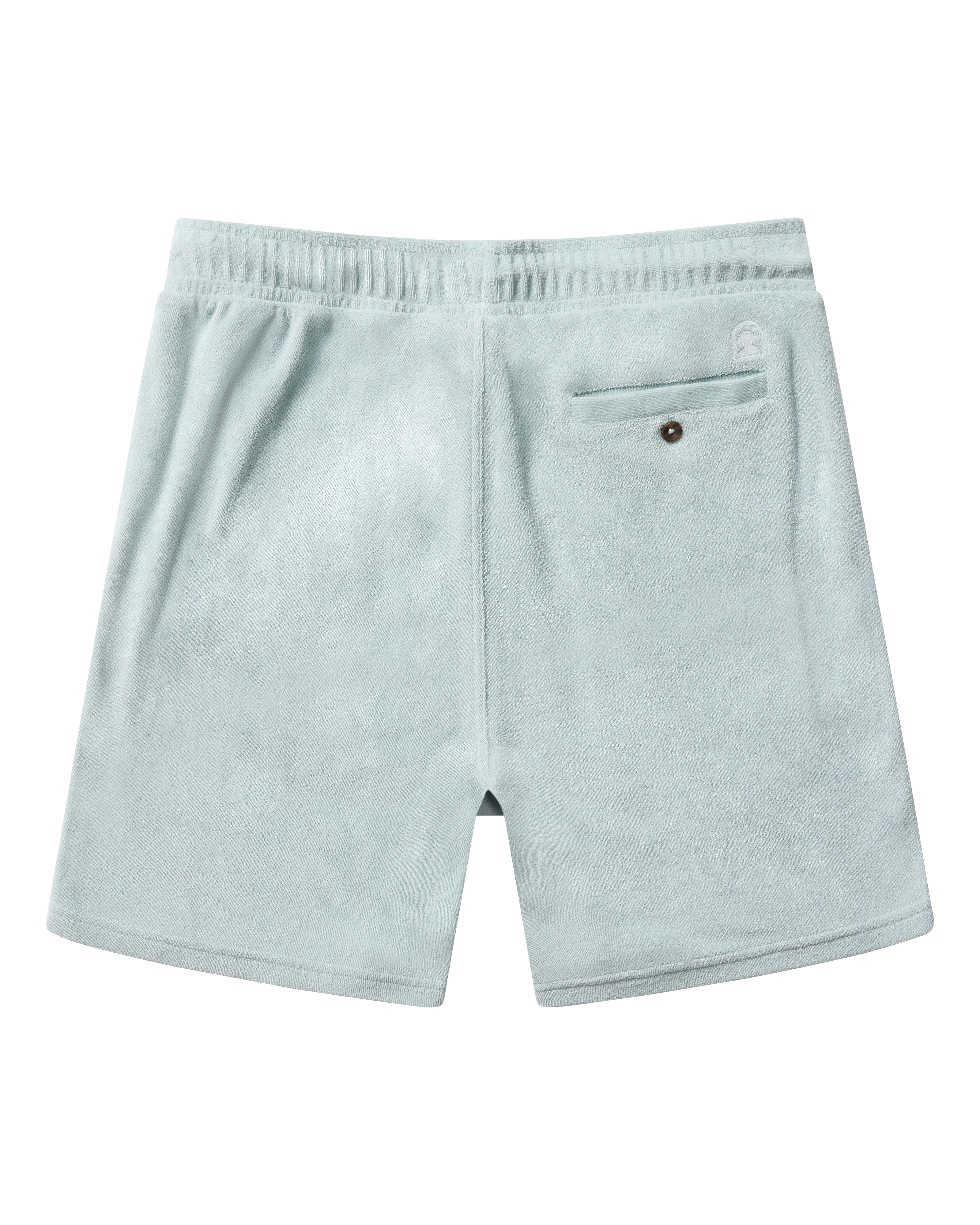 The Tropez Shorts in Gulf Blue by Dandy Del Mar feature soft, light blue terry cloth, an elastic waistband, and a single buttoned right back pocket.