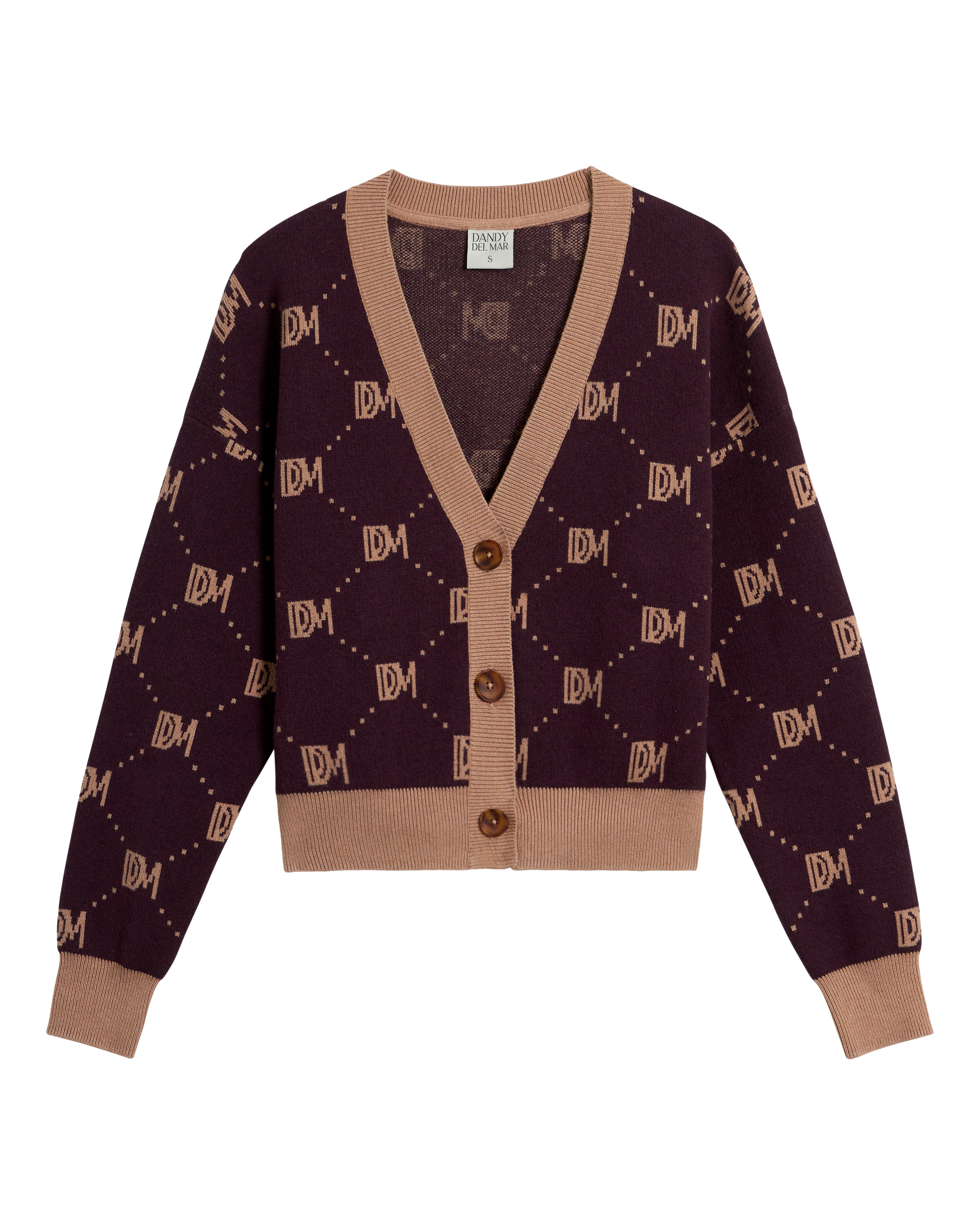 The Canela Cardigan - Amethyst by Dandy Del Mar is a maroon and beige cotton V-neck cardigan with button front and an all-over repeating "IDM" monogram pattern.