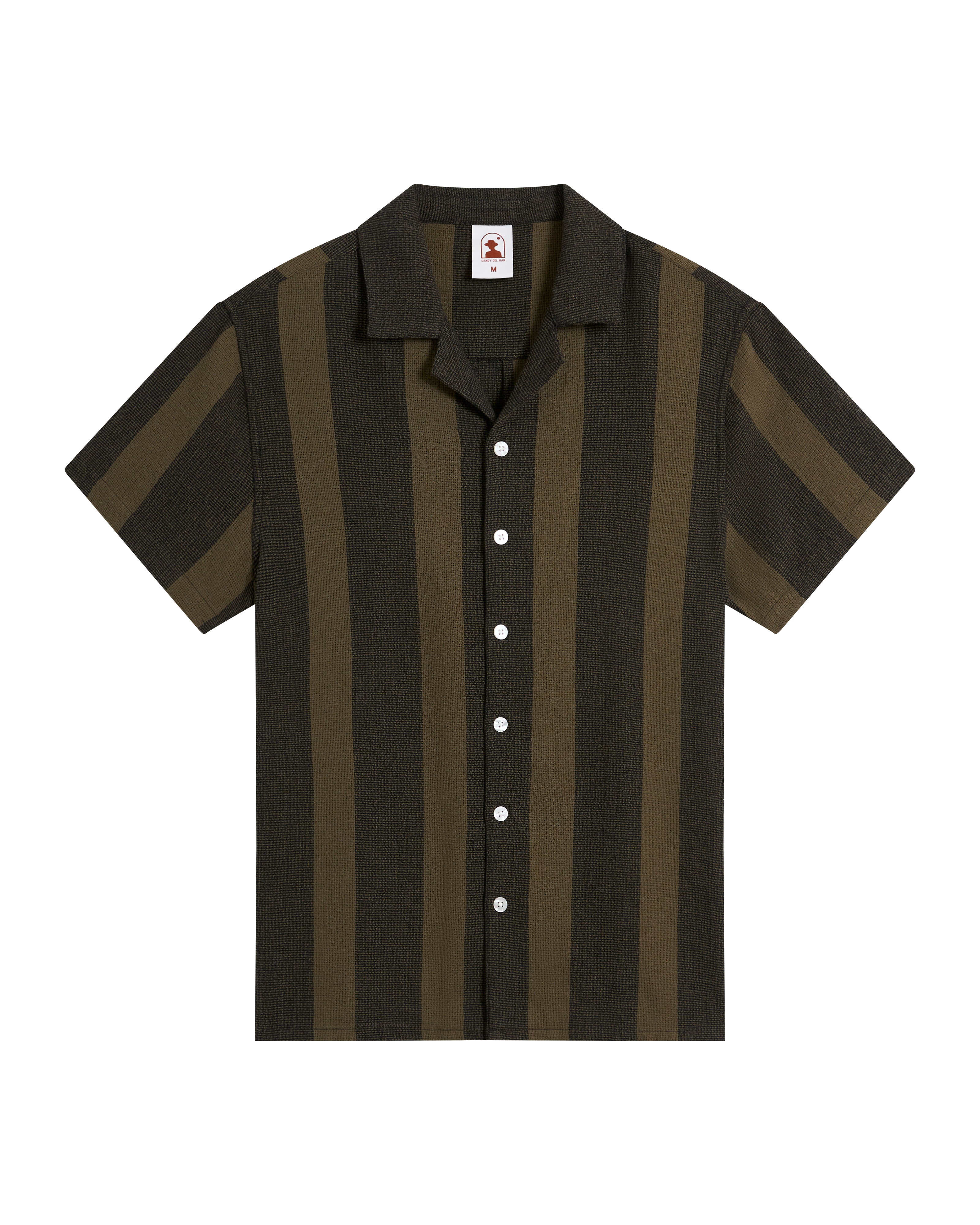 The Palma Shirt - Onyx by Dandy Del Mar is a short-sleeve button-up with dark and light olive green vertical stripes, a camp collar, and white buttons, crafted from burlap-textured fabric and shown on a black background.