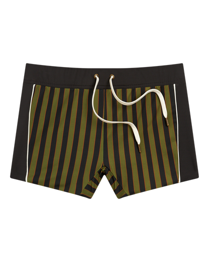 The Cassis Square Cut Swim Brief - Arbequina by Dandy Del Mar features a European fit, green, black, and brown stripes with black side panels, white piping and drawstring—crafted from recycled polyester.