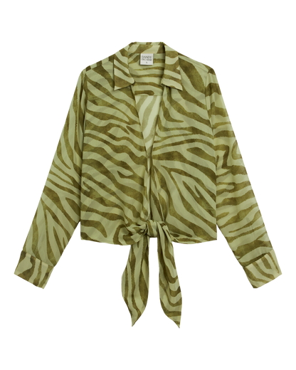 The Cayman Top - Arbequina by Dandy Del Mar is a long-sleeve, light green and beige zebra print collared blouse with a tie front, crafted from lightweight chiffon and shown on a plain background.