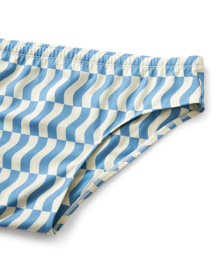 A blue and white Belize Swim Brief - Annapolis, designed by Dandy Del Mar, with a wavy pattern.
