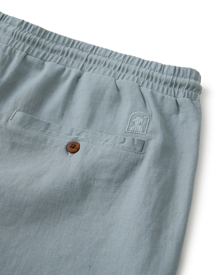 A pair of Brisa Linen shorts with an elastic waist pant.