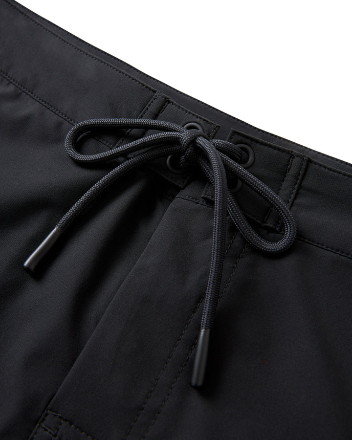 A close up of The Cavoli Swim Short - Onyx by Dandy Del Mar with a drawstring.