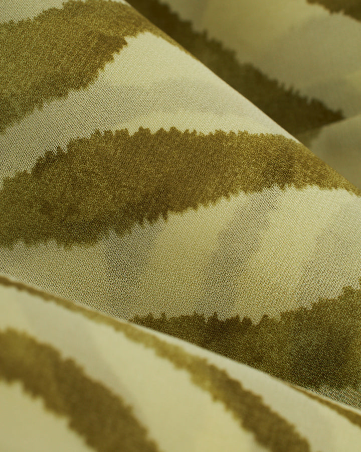 A close up of The Cayman Top - Arbequina fabric by Dandy Del Mar.