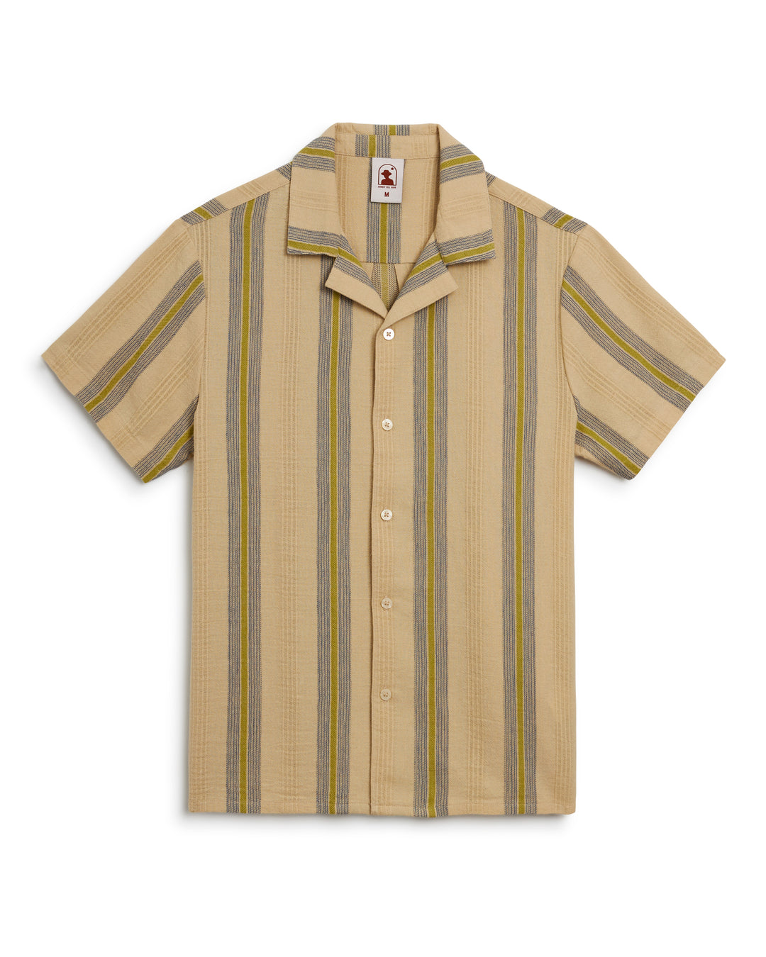 The Ginger Shirt by Dandy Del Mar is a leisurely striped shirt in tan, featuring vibrant yellow and blue stripes. Made from premium gauze fabric, this shirt offers both comfort and style.