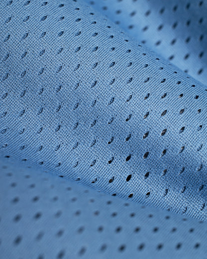 A close up of a Dandy Del Mar Kaena Mesh Tee - Annapolis.