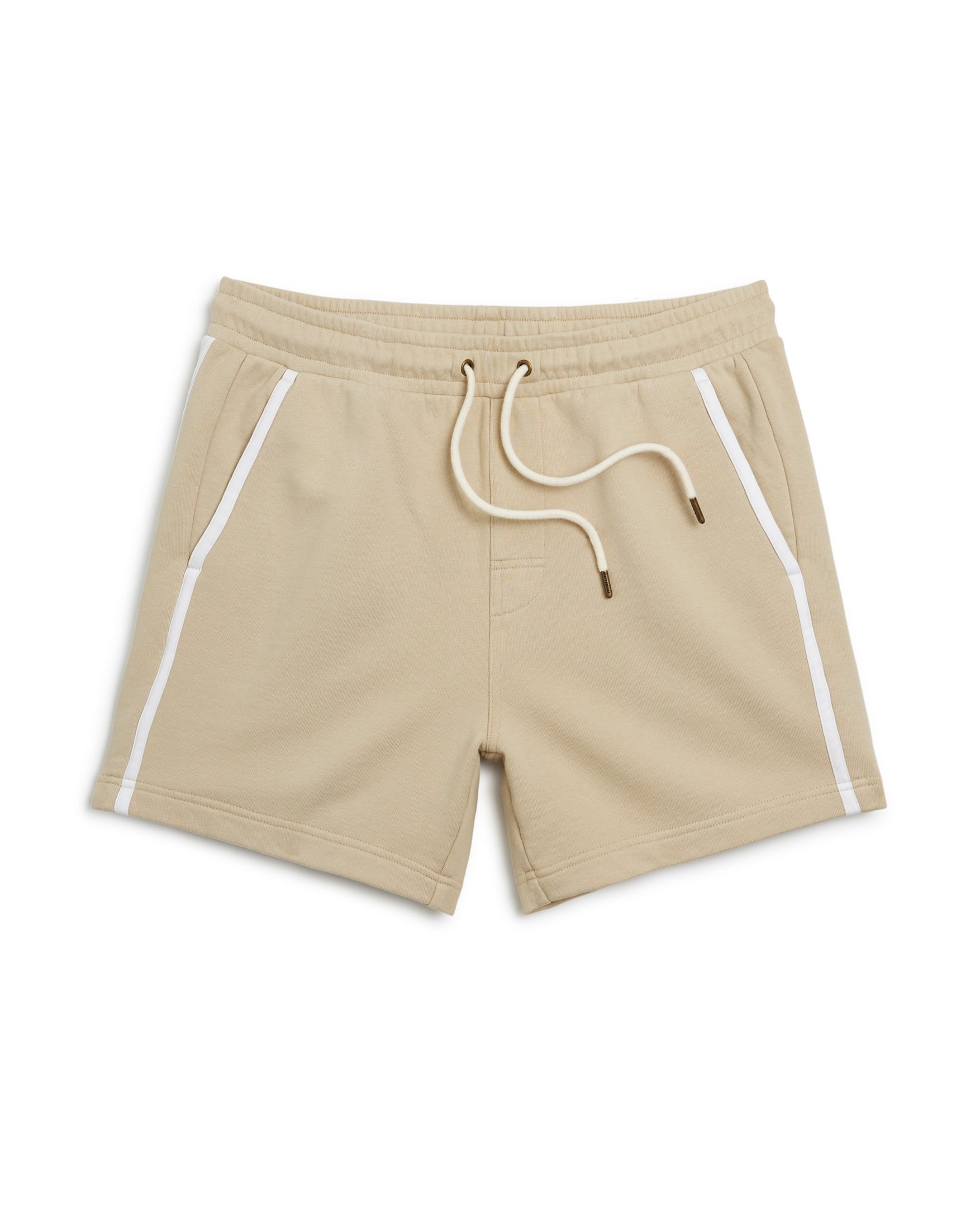 The Marseille French Terry Short in ginger by Dandy Del Mar showcases an elastic waistband, white drawstrings, and side pockets with white piping accents, crafted from soft French terry for ultimate comfort.