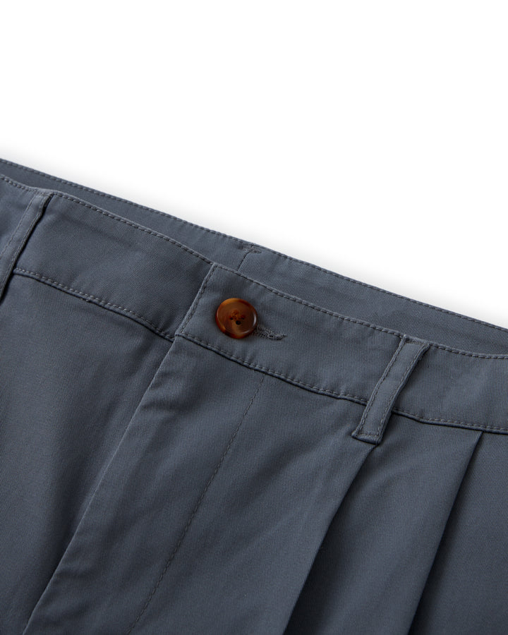 A close up of The Rhodes Twill Short - Abyss by Dandy Del Mar, a washed cotton twill grey chino pant with buttons.