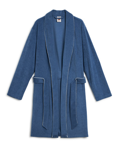 The Tropez Robe - Annapolis by Dandy Del Mar is an ultra-soft blue bathrobe with an above-the-knee fit, white piping, long sleeves, a shawl collar, pockets, and a matching belt.