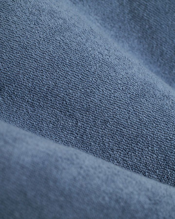 A close up of a blue Dandy Del Mar Tropez Short - Annapolis fabric.