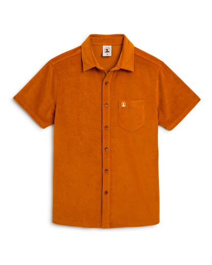 Experience Côte d'Azur charm with The Tropez Shirt in Burnt Sienna by Dandy Del Mar, a short-sleeve button-up featuring a chest pocket and logo.