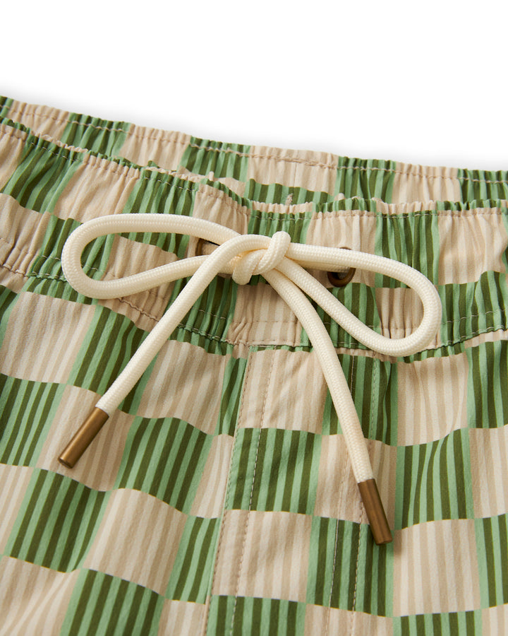 A green and beige checkered Ventura Volley Short - Arbequina by Dandy Del Mar with a drawstring.