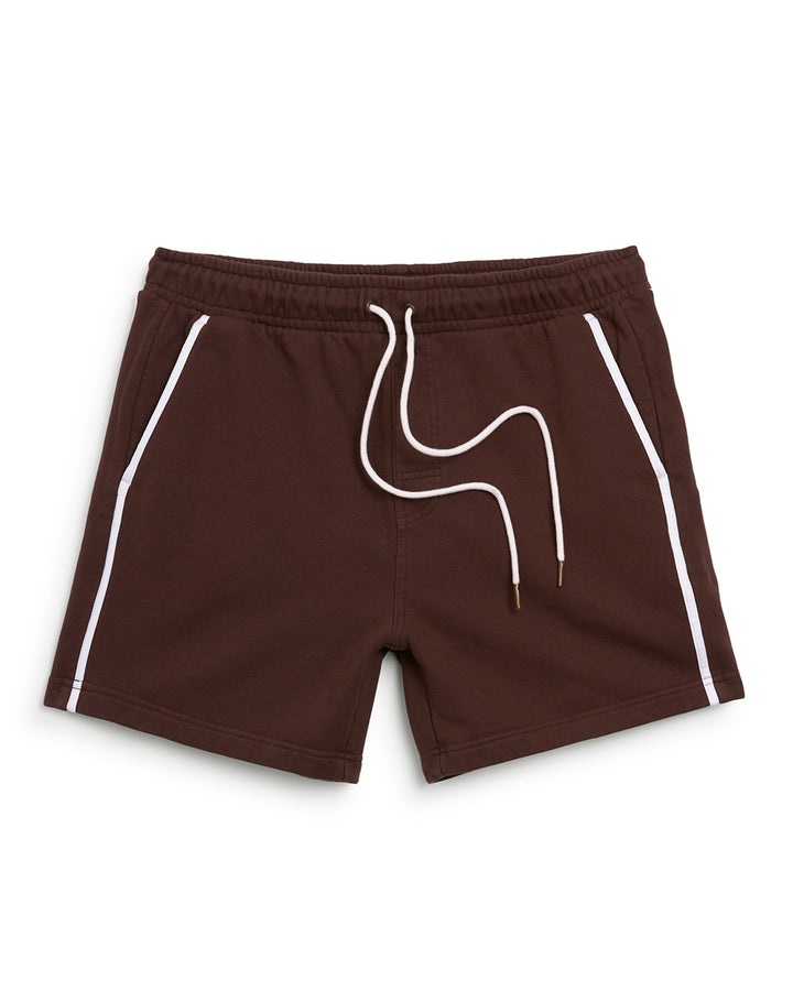 The Carajillo Marseille Short by Dandy Del Mar is a men's brown swim short with white piping, perfect for leisure activities.
