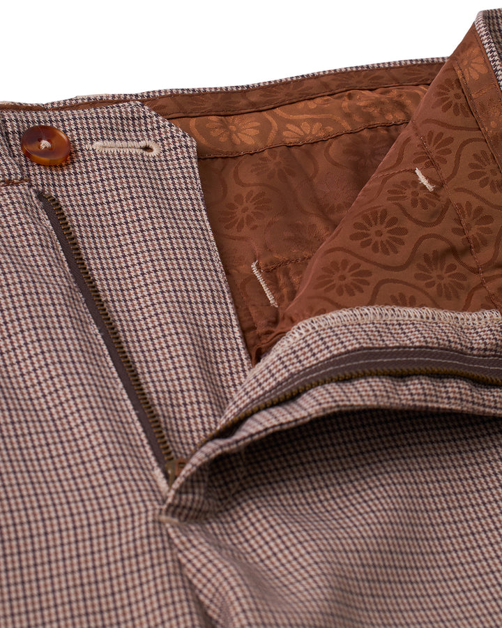 A close up of the Dandy Del Mar Tresco Trouser - Carajillo, a brown and tan checkered pants.