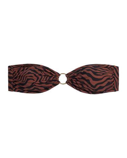 The Gomera Top - Onyx by Dandy Del Mar showcases a strapless silhouette in a brown and black zebra print, accented with a central circular metal ring.