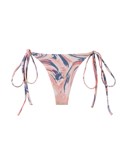 The Kokomo Bottom - Lantana by Dandy Del Mar features a pink, blue, and cream marble pattern with side tie straps, shown on a white background.