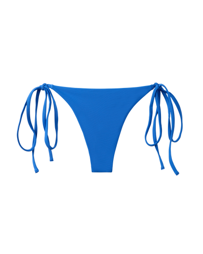 The Kokomo Bottom - Solana by Dandy Del Mar features a bright blue shade and adjustable side ties, showcased on a plain white background.