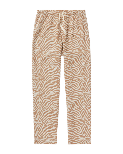 The Lucia Pant - Cortado Sawla Print by Dandy Del Mar features a beige and white zebra pattern, featherweight linen, elastic waistband, and drawstring, offering ultimate casual comfort. Shown laid flat on a white background.