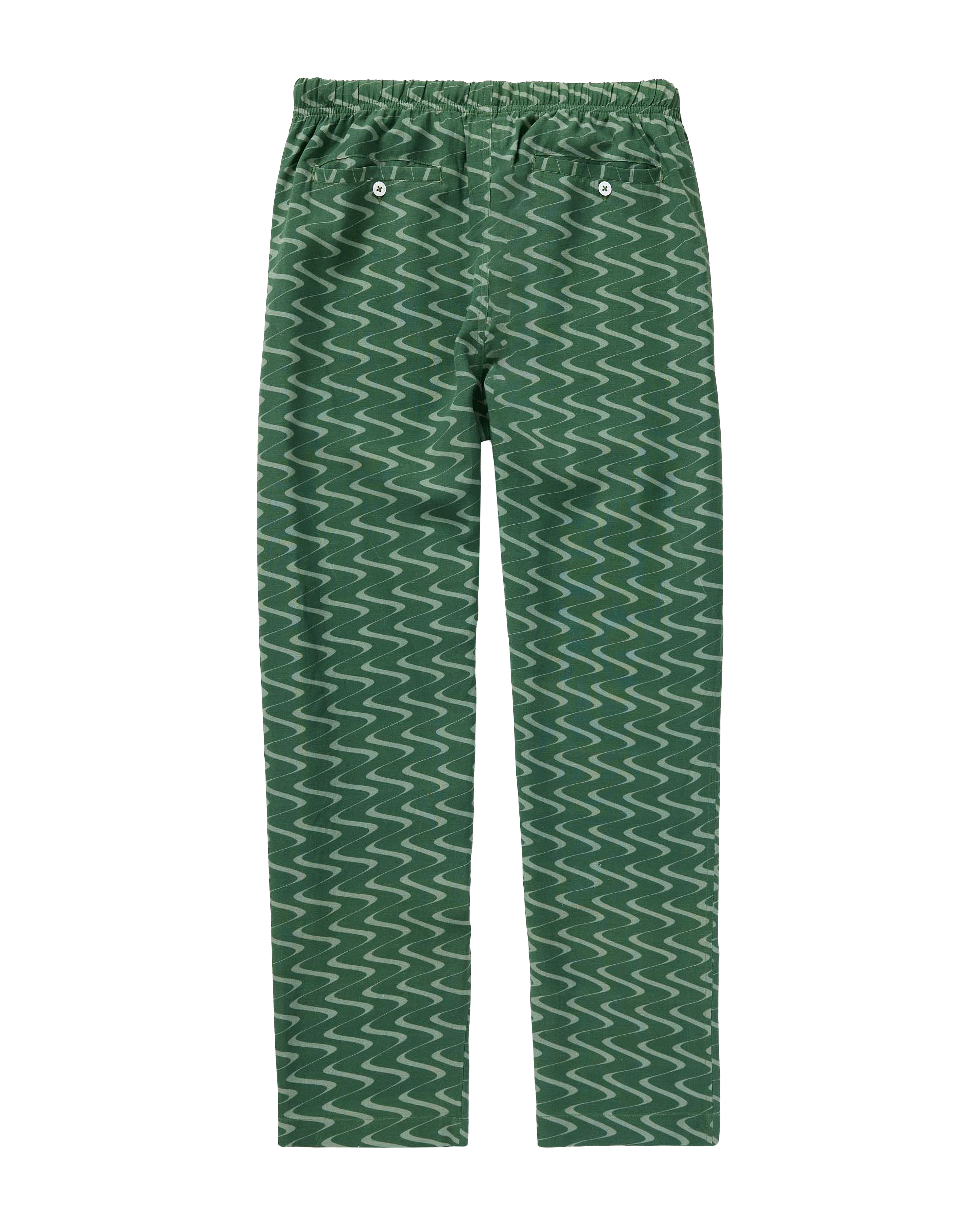 The Lucia Pant - Emerald Tidal Print by Dandy Del Mar features a wavy emerald design, elastic waistband, and two back button pockets in relaxed featherweight linen, shown laid flat on a plain background.