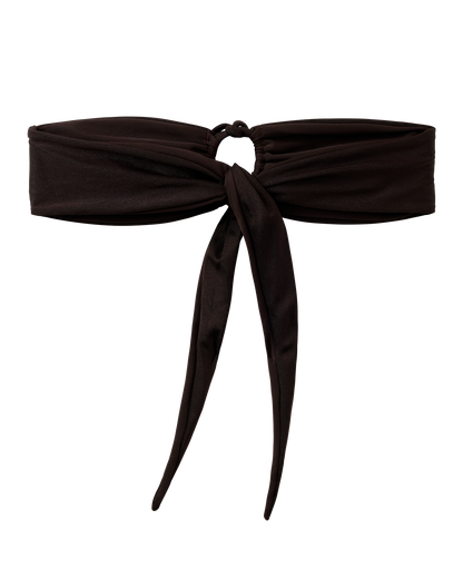 The Biarritz Top - Tierra by Dandy Del Mar is a black tie-front bandeau bikini top featuring a front knot and hanging fabric ties for versatile styling.