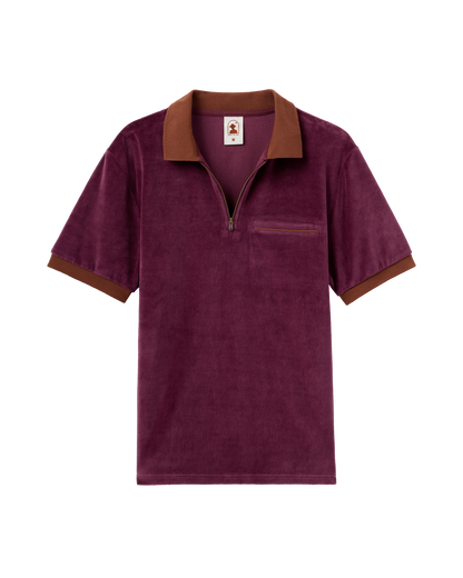 The Rio Velour Shirt - Bordeaux by Dandy Del Mar features maroon short sleeves, brown collar and cuffs, an antique brass zipper, and a chest pocket—a touch of luxury for any occasion.