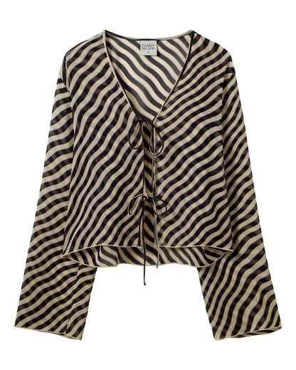 The Curacao Top - Tierra by Dandy Del Mar features long sleeves, a wavy black and beige striped chiffon fabric, front tie closures, bell sleeves, and a V-neckline.