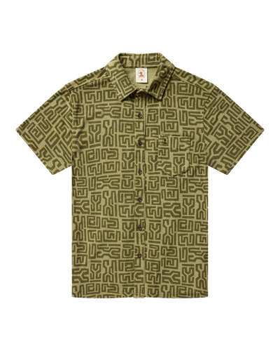 The Tropez Terry Cloth Shirt - Berdea Tayana Print by Dandy Del Mar features short sleeves, a chest pocket, and a collar in an olive and dark green geometric pattern—ideal for relaxed Côte d'Azur style.