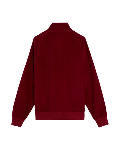 The Dandy Del Mar Corsica Corduroy Jacket - Sangria is shown from the back, featuring long sleeves, a ribbed hem, and a high collar.