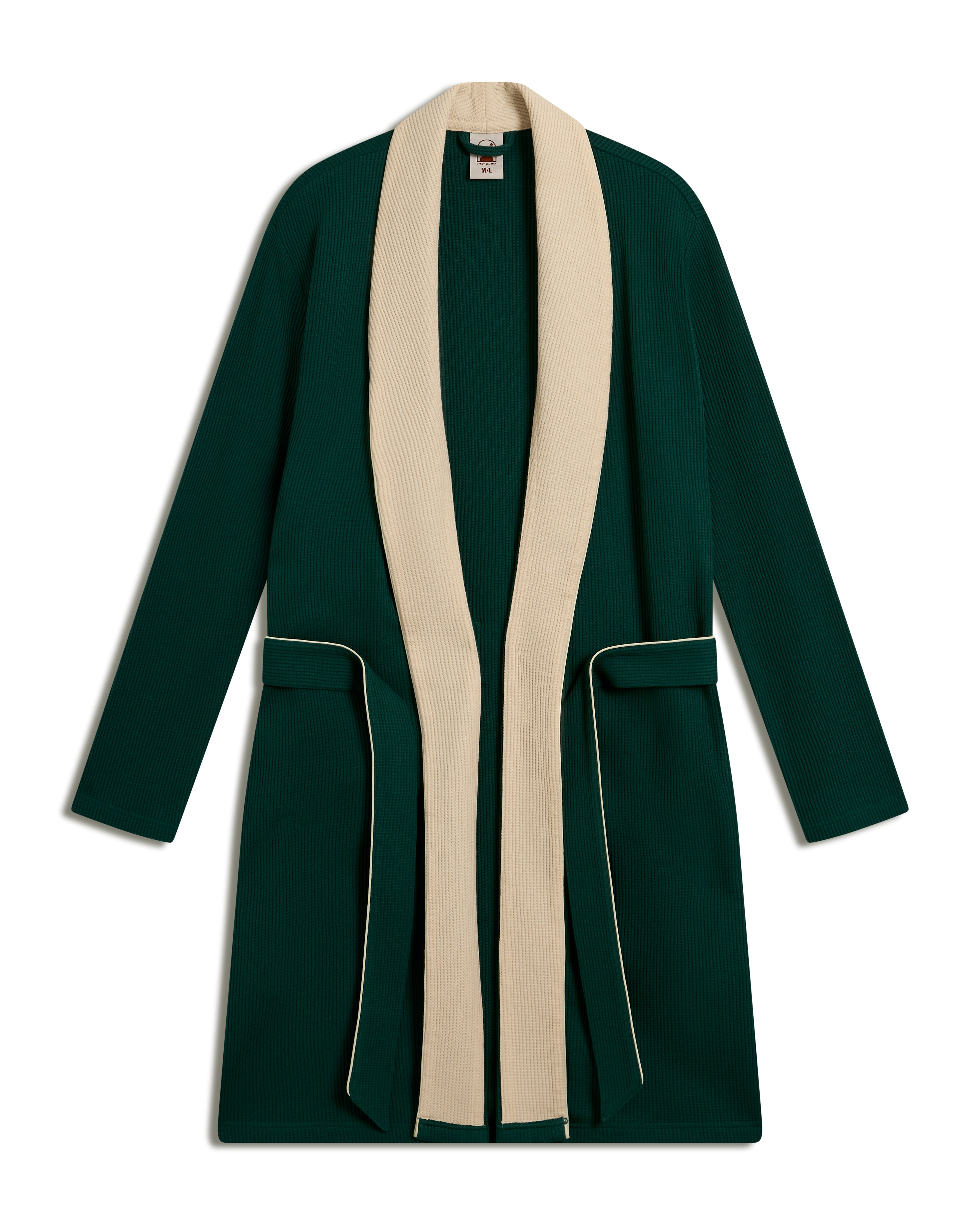 The Cannes Waffle Knit Robe - Albero by Dandy Del Mar is a long green cardigan with a cream lapel and belt, showcasing ribbed fabric and pocket detailing.