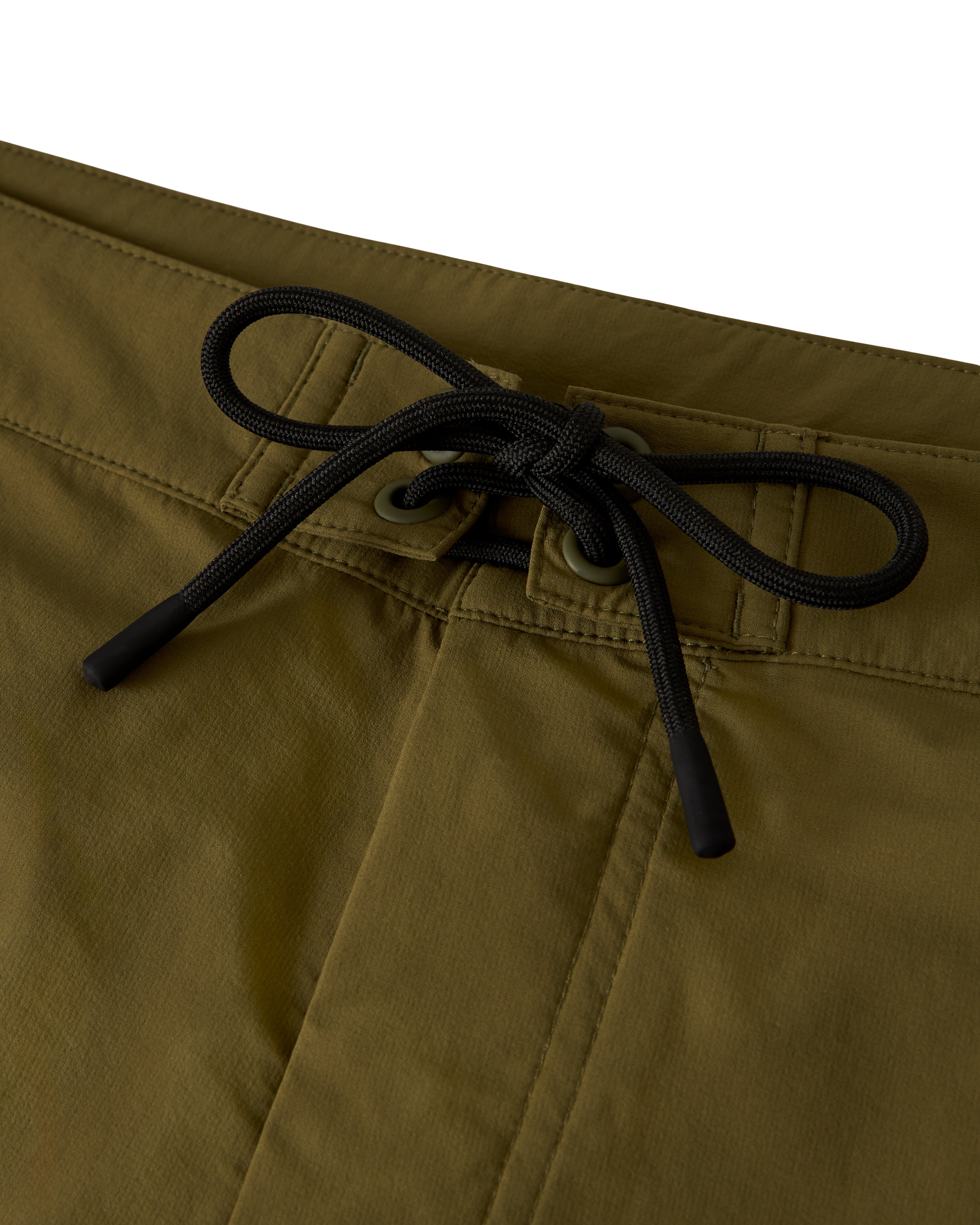 Close-up of The Cavoli Swim Short - Berdea by Dandy Del Mar, showcasing athletic swim trunks in olive green with a black lace waist tie, made from performance fabric.