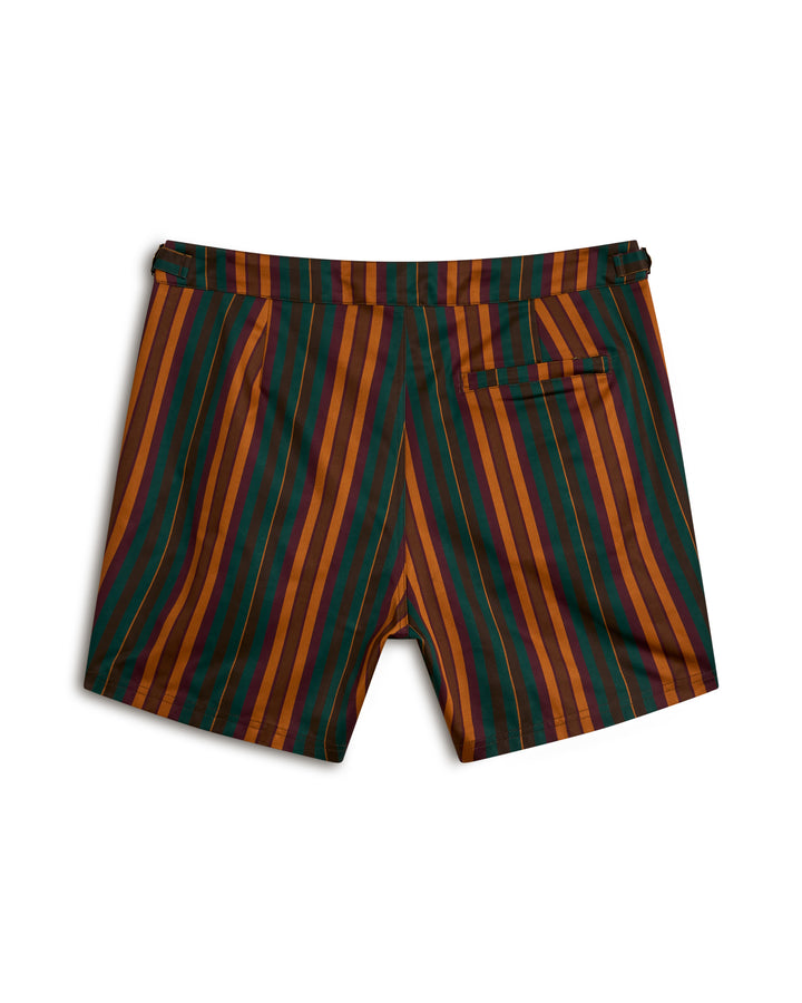 The Dandy Del Mar Mallorca Swim-Walk Short in Burnt Sienna has vertical stripes in orange, green, and brown and includes a single back pocket.