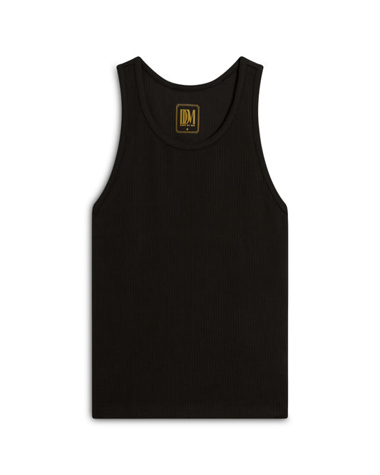 The Milan Rib Tank - Onyx by Dandy Del Mar is a black sleeveless ribbed top with a small gold logo on the inner collar.