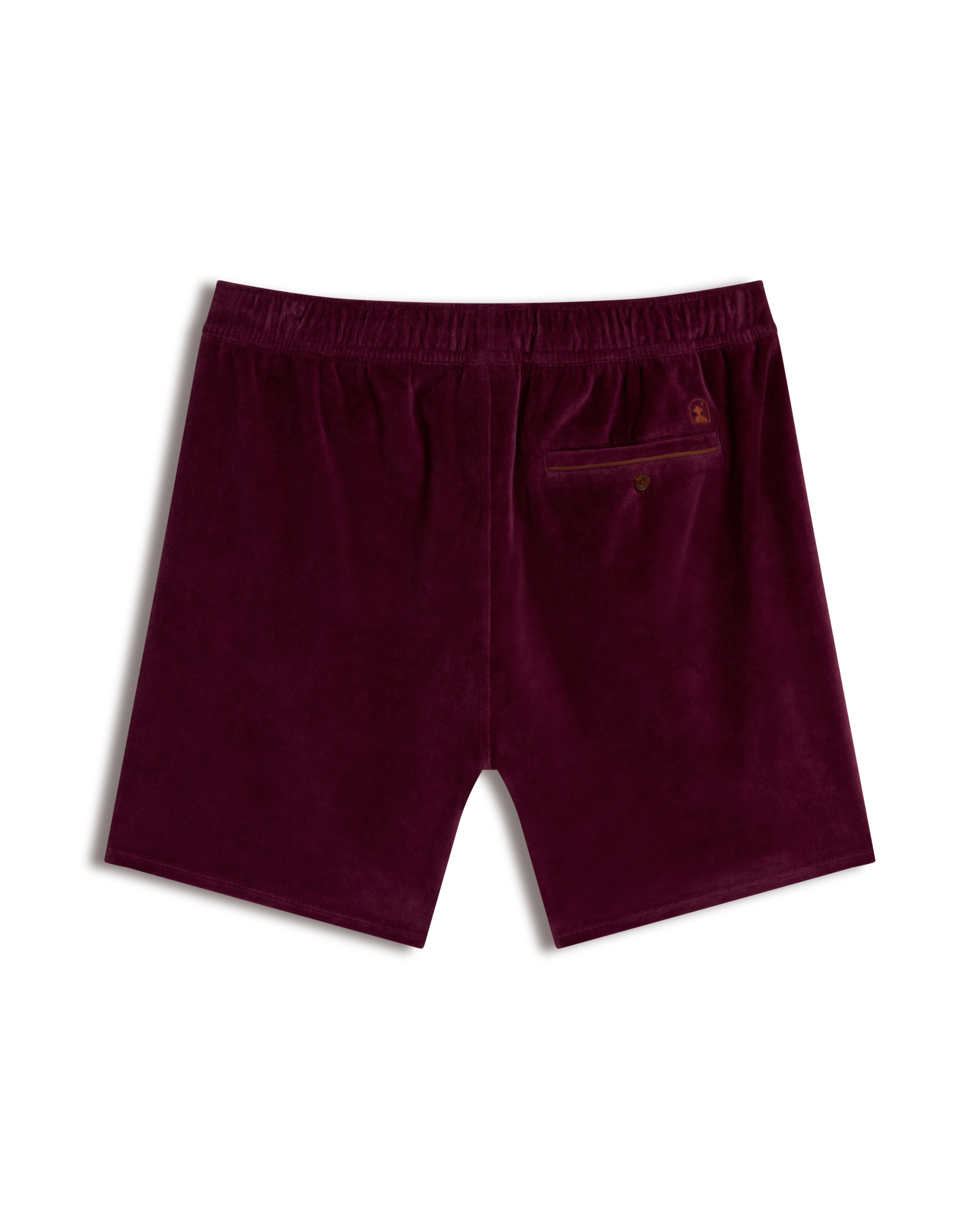 Back view of The Rio Velour Short - Bordeaux by Dandy Del Mar, showcasing an elastic waistband and single buttoned back pocket—ideal for a stylish athletic look.
