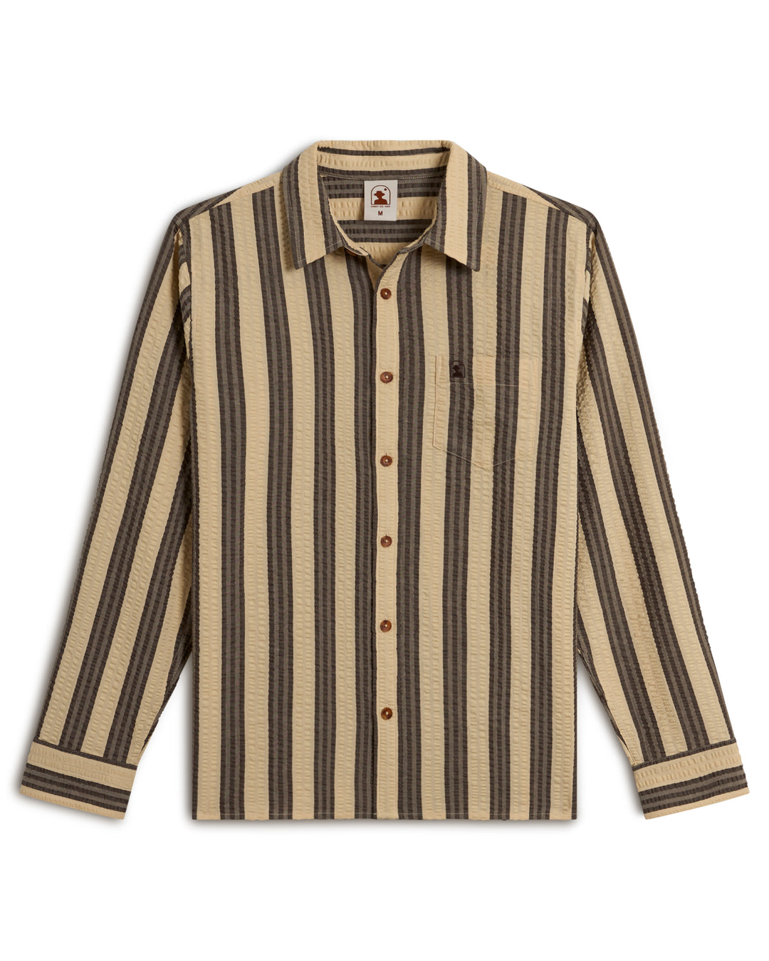 The Santos Shirt - Tierra Weave by Dandy Del Mar is a long-sleeved shirt featuring black and beige vertical stripes, a button front, collar, and a chest pocket on a white background.