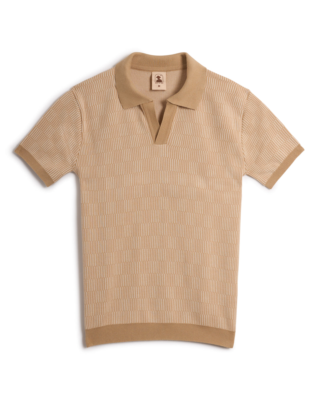 The Sebastian Knit Polo Shirt - Shell by Dandy Del Mar is a short-sleeve, beige knit polo shirt featuring a ribbed collar, sleeve cuffs, and hem, along with a subtle textured pattern.