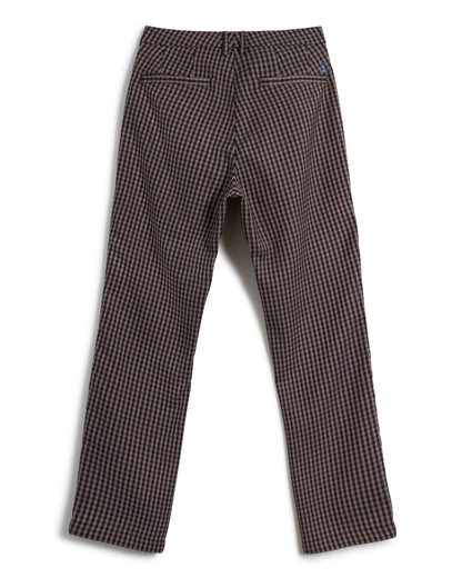 Back view of a pair of The Tresco Trouser - Tierra Houndstooth by Dandy Del Mar, styled in brown and black checkered with side pockets against a white background.