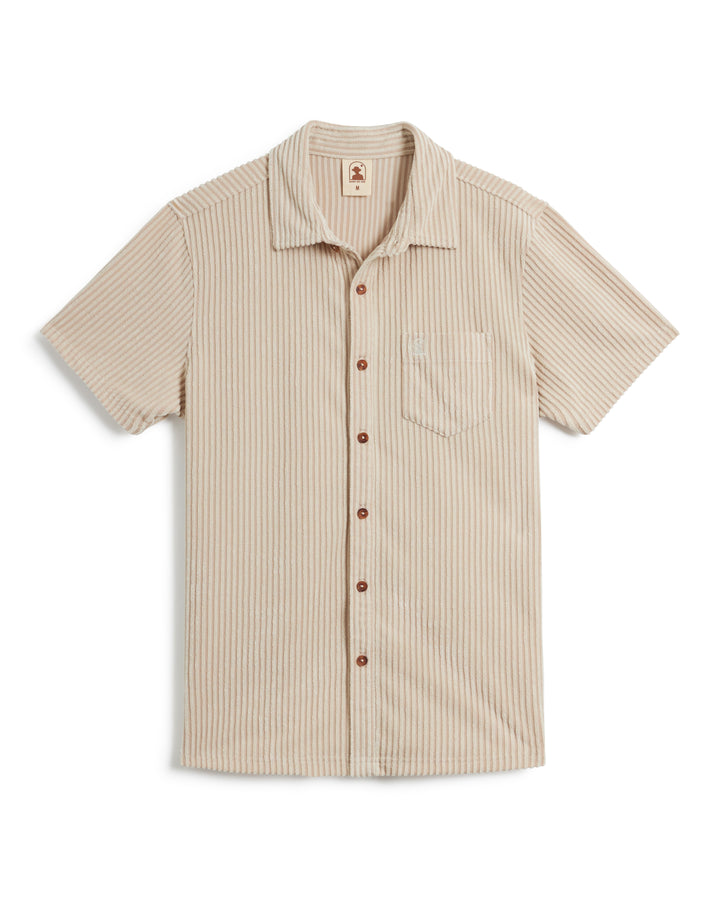 The Tropez Jacquard Shirt - Scallop Stripe by Dandy Del Mar is a beige short-sleeve button-up with vertical stripes, a chest pocket, and jacquard striped terry cloth that evokes the relaxed charm of Côte d'Azur.