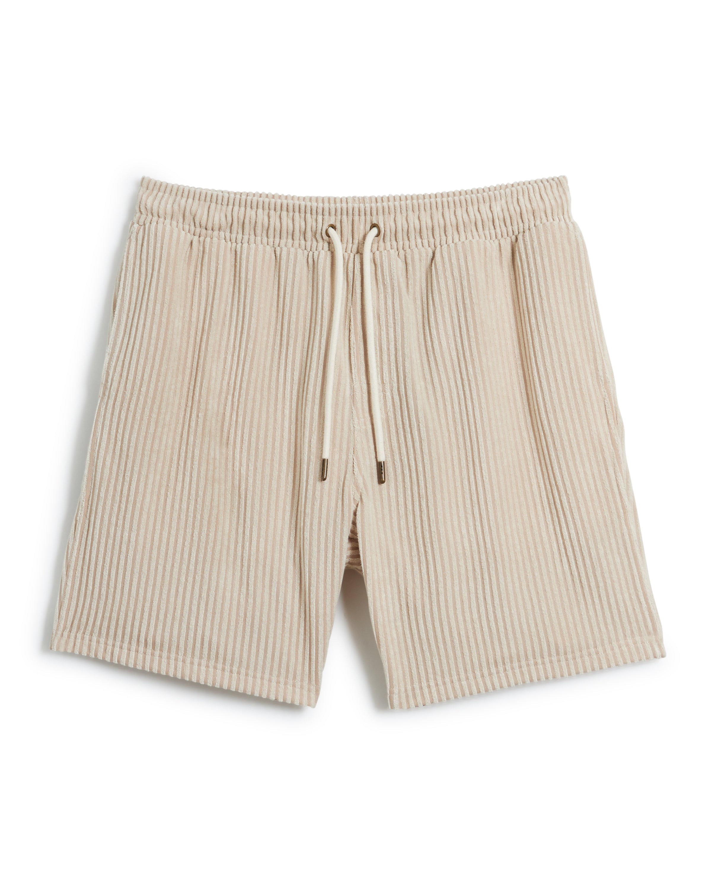 A pair of The Tropez Jacquard Shorts - Scallop Stripe by Dandy Del Mar in beige, featuring an elastic waistband and white drawstrings.