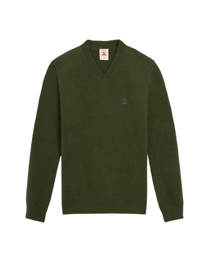 The Lima Sweater - Selva by Dandy Del Mar is a plain dark green V-neck sweater with classic long sleeves, shown on a white background.