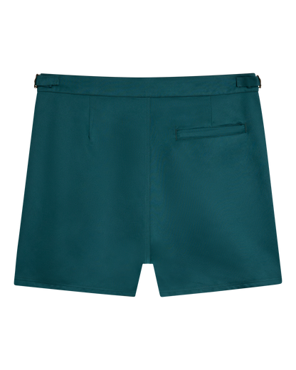Back view of The Mallorca Swim-Walk Short by Dandy Del Mar in Tempest Blue, featuring nylon fabric, a single right welt pocket, and belt loops at the waistband.