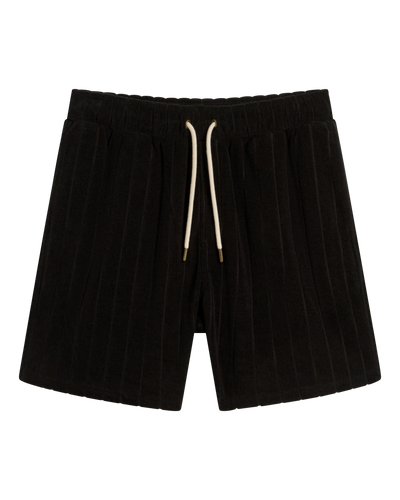 The Tropez Jacquard Shorts - Onyx by Dandy Del Mar feature black pleated lounge shorts with an elastic waistband, white drawstring, and jacquard striped terry cloth, shown on a plain white background.