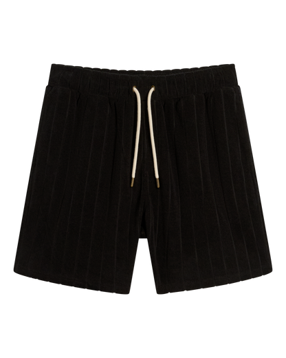 The Tropez Jacquard Short - Scallop Stripe by Dandy Del Mar features black pleated jacquard striped terry cloth, an elastic waistband, and a white drawstring with gold metal tips.