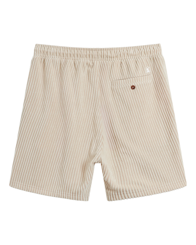 The Tropez Jacquard Shorts - Scallop Stripe by Dandy Del Mar feature beige and white vertical stripes, jacquard terry cloth, an elastic waistband, and a single back pocket with button closure.