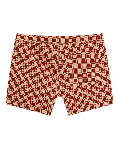 The Ventura Volley Shorts - Rouge by Dandy Del Mar: red and beige geometric men’s swim shorts with an elastic waist and single back pocket, shown flat on a white background.