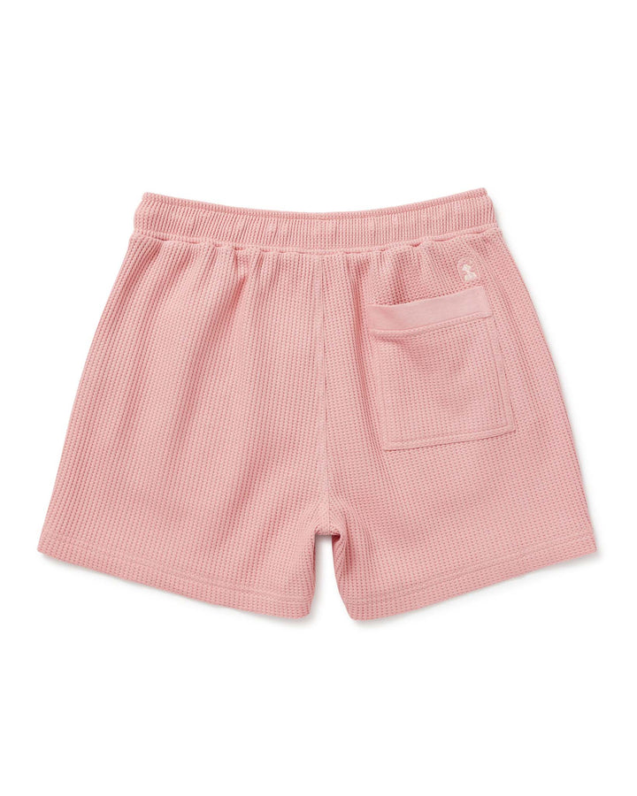 A Dandy Del Mar Cannes Waffle Knit Shorts in Spanish Rose with a pocket on the side.