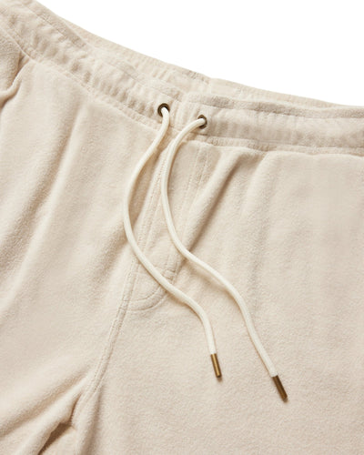 Close-up of the waistband of Dandy Del Mar’s The Gaucho Terry Cloth Shorts in Alabaster, featuring an elastic band and white drawstring with metal aglets.